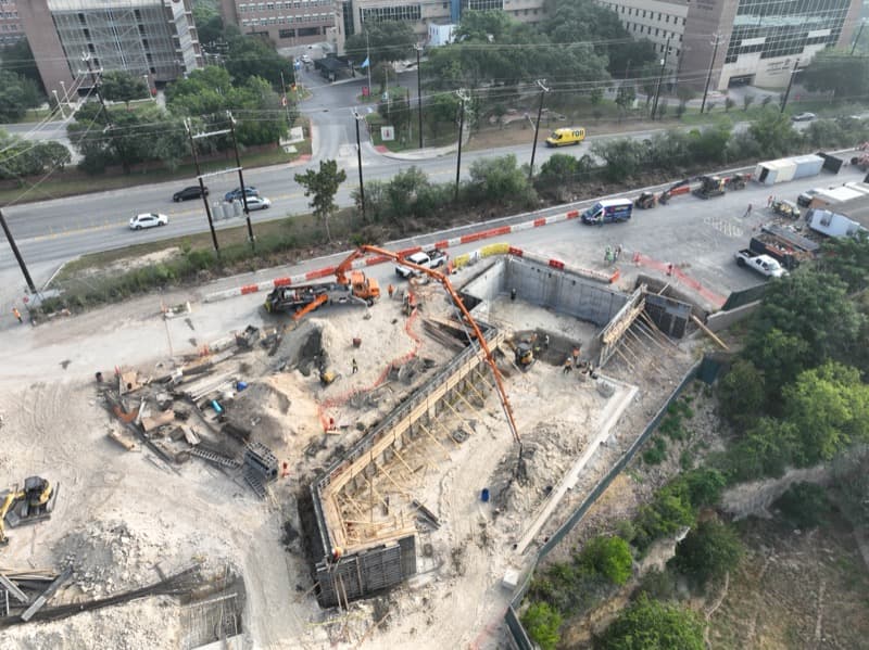 Deep concrete structure and utility vault construction